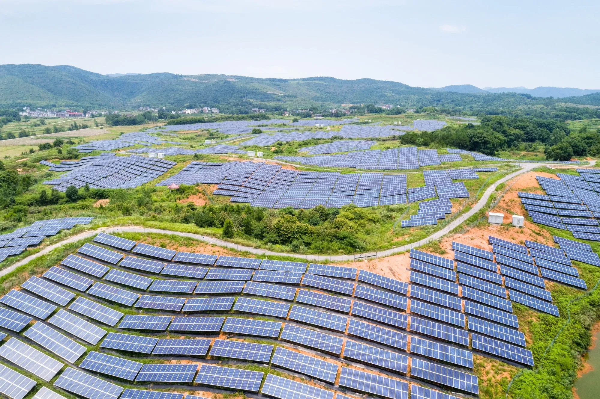 solar-power-station-on-hillside-aerial-view-of-renewable-energy